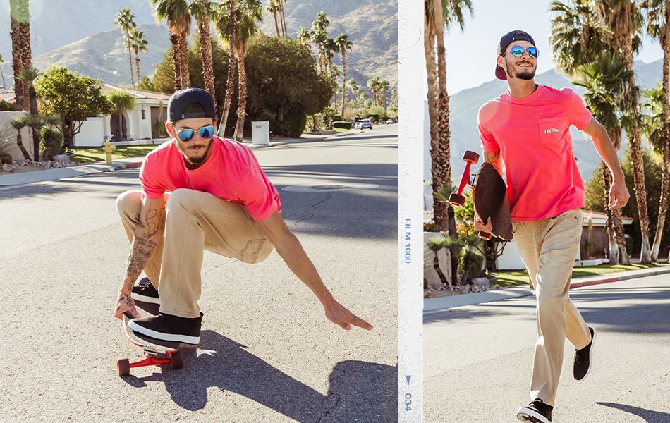 Men's Pants - A guy wearing a red graphic tee with a pair of khaki pants and a pair of black sneakers